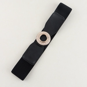 Detail of black elastic belt featuring a golden round buckle with sparkly rhinestones