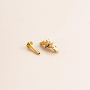 G23 titanium labret stud with internally threaded gold base and clear zircon stone