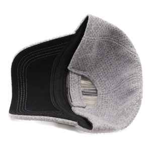Detail view of heather grey wool baseball cap showing inner sweatband and stitching