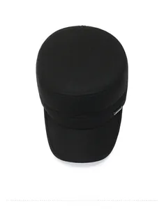 Top view of a black flat top military style cap with silver sport metal logo detail