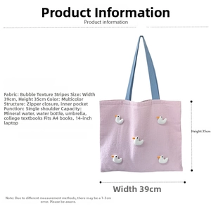 Detail of pink striped tote bag with cute duck dolls showing interior zip pocket and lining