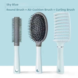 Sky blue hair brush set featuring vent brush, cushion brush and round styling brush