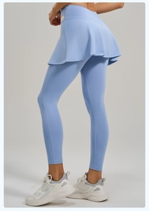 Detail view of high waist light blue skort leggings with moisture-wicking fabric