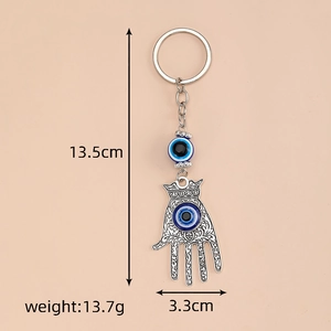 Detailed view of Hamsa Hand keychain with Evil Eye bead, 13.5cm length dimensions shown