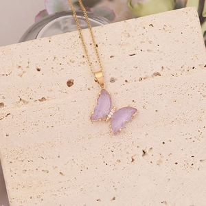 Elegant 18K gold butterfly pendant necklace with lavender resin and zircon accents