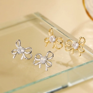 Exquisite 18K Gold Plated Copper Bow Knot Stud Earrings With Heart Shaped Zirconia Elegant Fashion Jewelry For Women