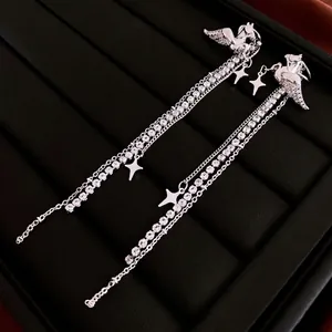 Diamond-encrusted Pegasus tassel earrings with silver stars and dangling chains