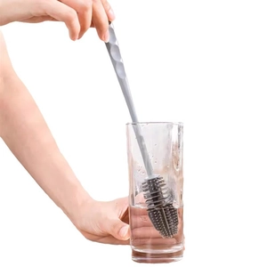 Long handle silicone cup brush for cleaning deep bottles and glassware on white background