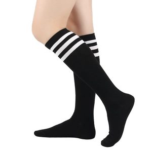 Detail showing the white triple stripes on the cuff of a black knee-high sock