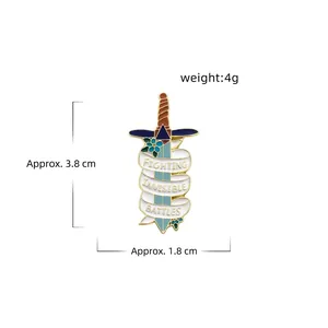 Cartoon sword enamel pin with blue flowers and motivational ribbon on gold alloy base