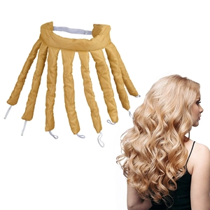 Detail of golden quilted heatless hair curler with 8 rods and wavy styling result