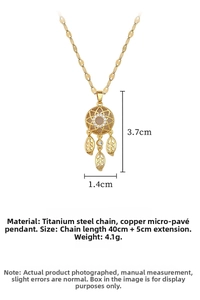 Macro view of gold feather pendant with 3.7x1.4cm dimensions and titanium chain