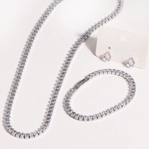 Elegant silver-toned jewelry set with water-drop cubic zirconia necklace, bracelet, and earrings