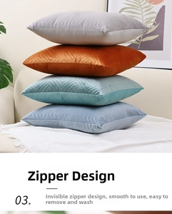 Detail showing invisible zipper and herringbone quilting on velvet pillow covers