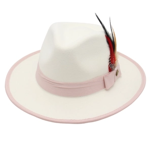 Elegant wide brim fedora hat in cream wool felt with pink ribbon trim and feather detail