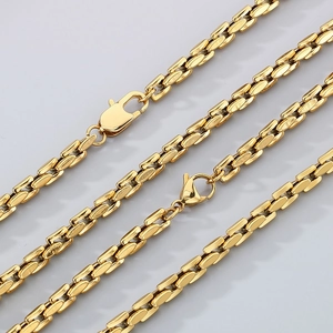 Poliertes goldene Edelstahl Armband mit Bambuskette und Karabinerverschluss auf Grau