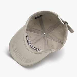 Beige cotton baseball cap with 3D embroidery and adjustable strap in a 45-degree angle
