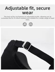 Detailed view of adjustable silver metal buckle and woven strap on a black baseball cap