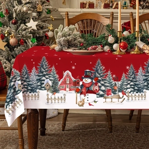 Red Christmas tablecloth with festive snowman and snowy landscape pattern for 2025 decor