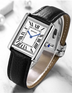 Close-up of SAMDA silver tank watch with blue hands, Roman numerals and leather strap