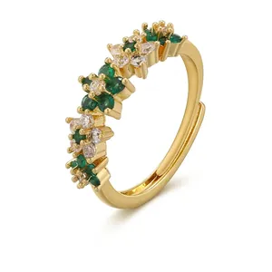 Minimalist gold-plated brass ring with green and white cubic zirconia gemstones