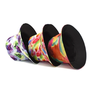 Three-piece set of tie-dye bucket hats with vibrant watercolor patterns and sun protection