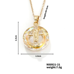 Detailed view of Virgin Mary cross pendant with iridescent base and 45cm gold chain