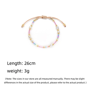 Detail view of colorful bead and freshwater pearl bracelet with 26cm length dimension
