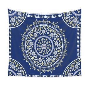Detailed close-up of dark blue Mandala tapestry with white floral and bohemian patterns