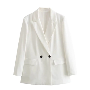 Detail of white double-breasted blazer showing black contrast buttons and lapel collar