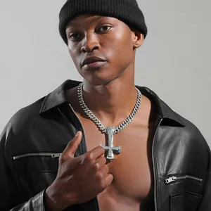Close-up of hip hop pendant with cubic zirconia stones on a wide Cuban link chain