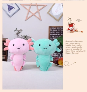 Close-up of pink and teal axolotl plush toys with soft gills and cute smiling faces