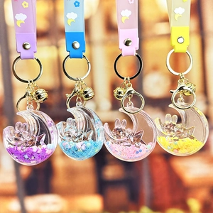 Cute moon bunny quicksand keychain set in purple blue pink and yellow colors