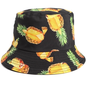 Reversible bucket hat for women with tropical pineapple print and wide brim protection