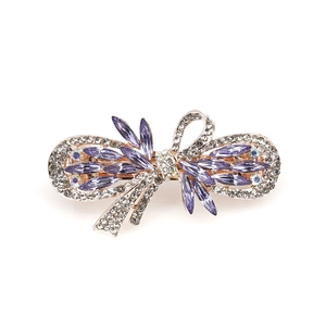 Pince à cheveux nœud en strass violets avec finition en métal or rose élégante