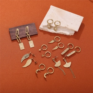 Elegant 18K gold-plated stainless steel earrings set with celestial pendants on stone
