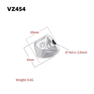 Detailed view of silver irregular faceted bead with 10mm x 9mm dimensions and 2.0mm hole