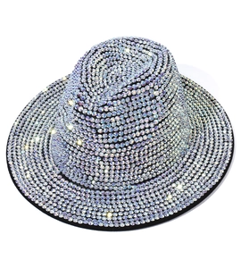 Detailed close-up of a jazz hat covered in sparkling multicolored rhinestones
