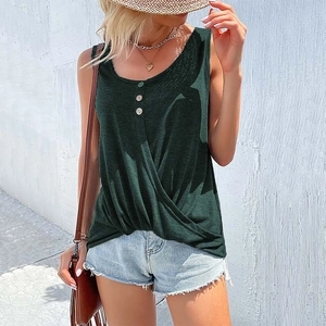 Close-up of dark green sleeveless top with round neck buttons and knotted hem detail