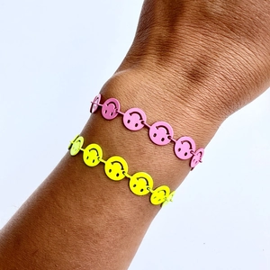 Bohemian gold plated chain bracelet with colorful smiley faces in pink and yellow