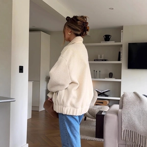 Oversized cream faux fur sherpa jacket with a minimalist loose fit for women