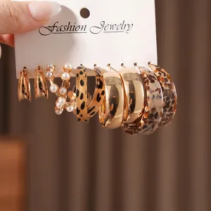 6-pair vintage leopard and pearl gold hoop earring set for women shown on a card