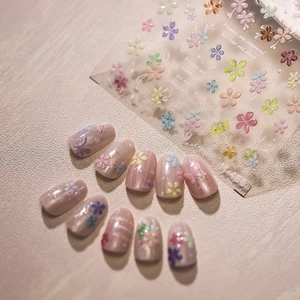 3D floral embossed nail stickers M-486 with colorful flowers on a natural stone background