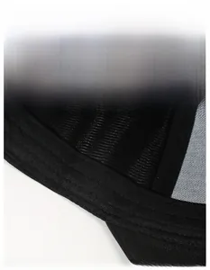 Detail of wide moisture-wicking sweatband and breathable mesh lining in baseball cap