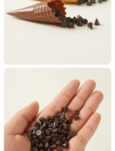 Macro shot of miniature dark chocolate cones and wafers for DIY dollhouse cake decoration