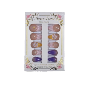 Almond press-on nails with purple gradients, pink 3D bows and floral pearl accents