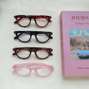Cat eye sunglasses for women with heart studs in black, tortoiseshell and pink frames
