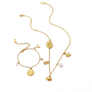 Golden beach style stainless steel jewelry set with shell starfish and pearl charms