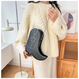 Unique boot-shaped black shoulder bag with white star embroidery and silver chain strap