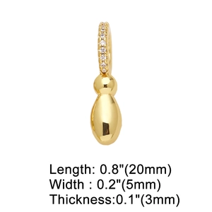 Detail of gold heart charm with crystal-set loop and precise size measurements